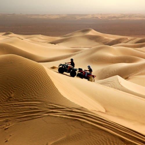 quad biking in the dunes