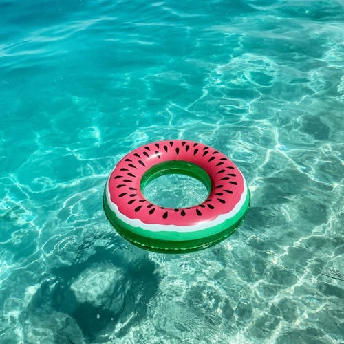 An inflatable ring floating in the clear waters of Umluj, Saudi Arabia
