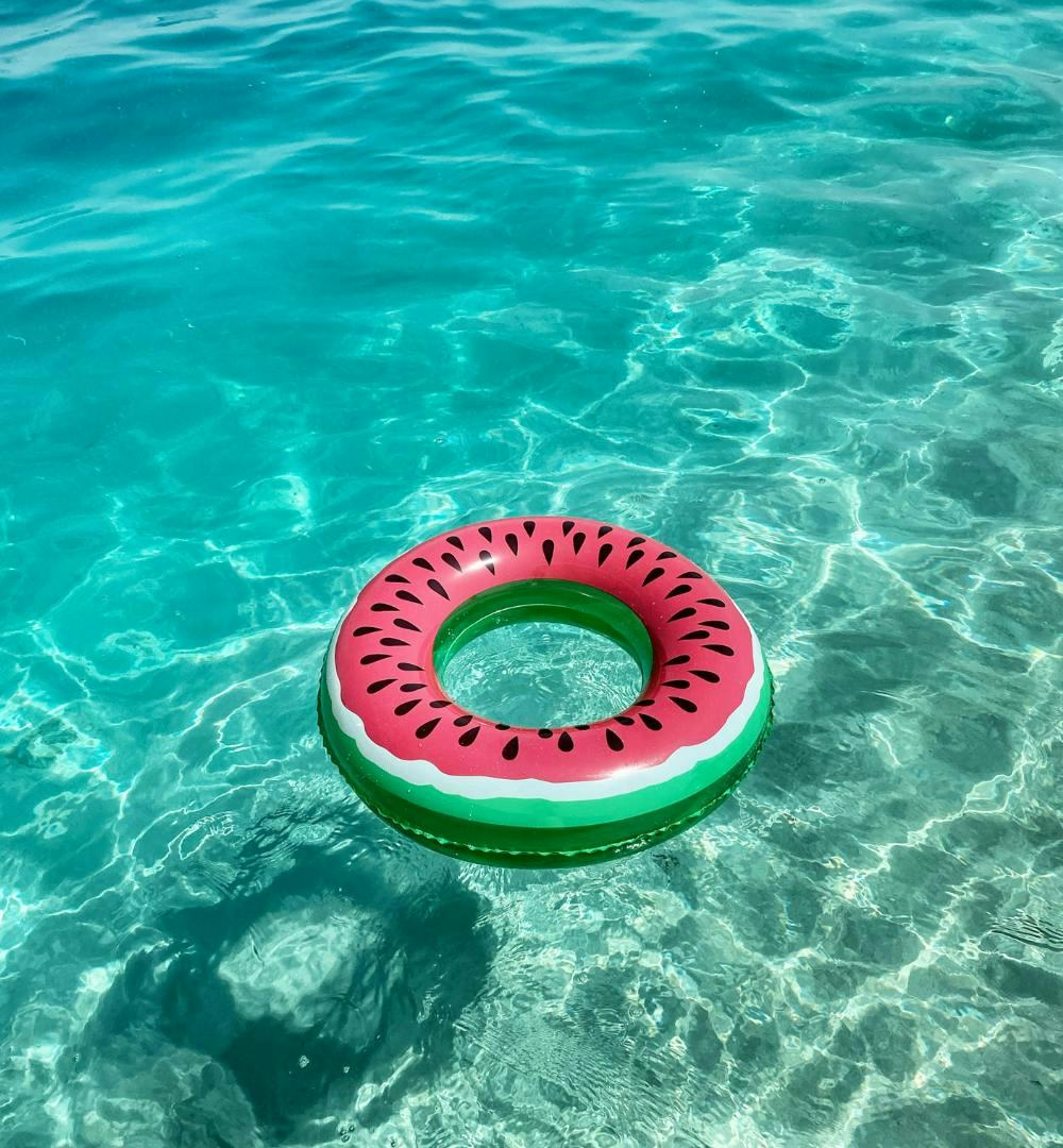 An inflatable ring floating in the clear waters of Umluj, Saudi Arabia