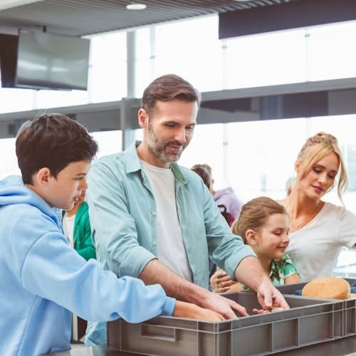 A family going through airport security together