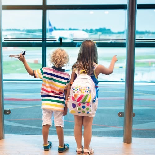 Kids at the gate in the airport