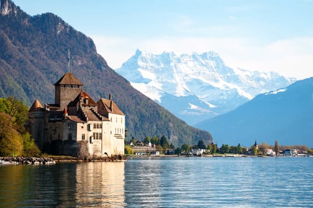 A castle on the shoreline of Lake Geneva