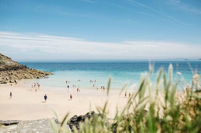 A view of the Cornish coastline with blue seas