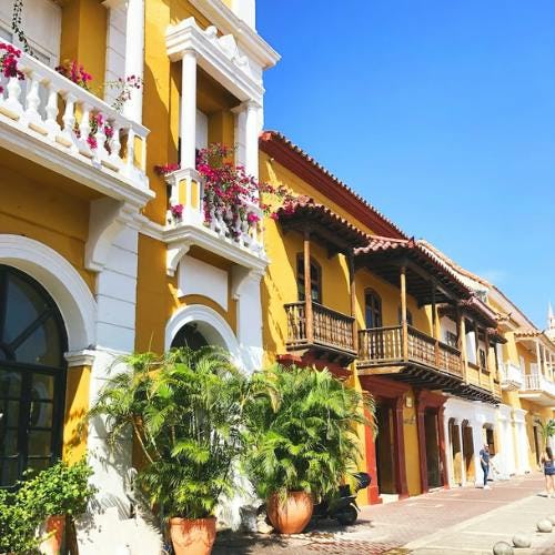 Image of yellow and white houses in Cartagena, Colombia