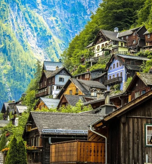 Wooden houses on a hill in Austria