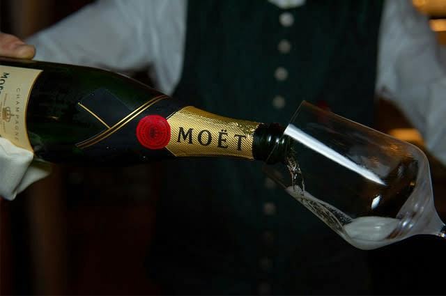 Bottle of Moet being poured 