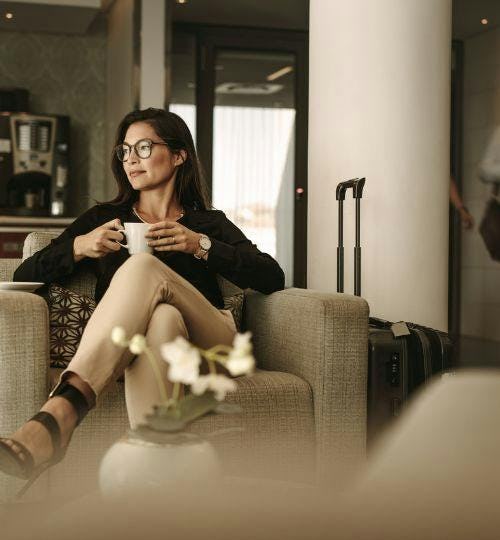 Woman sitting in an airport lounge