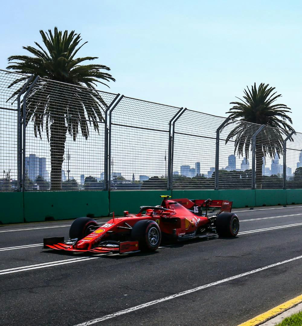 A formula 1 car driving by in Melbourne, Australia