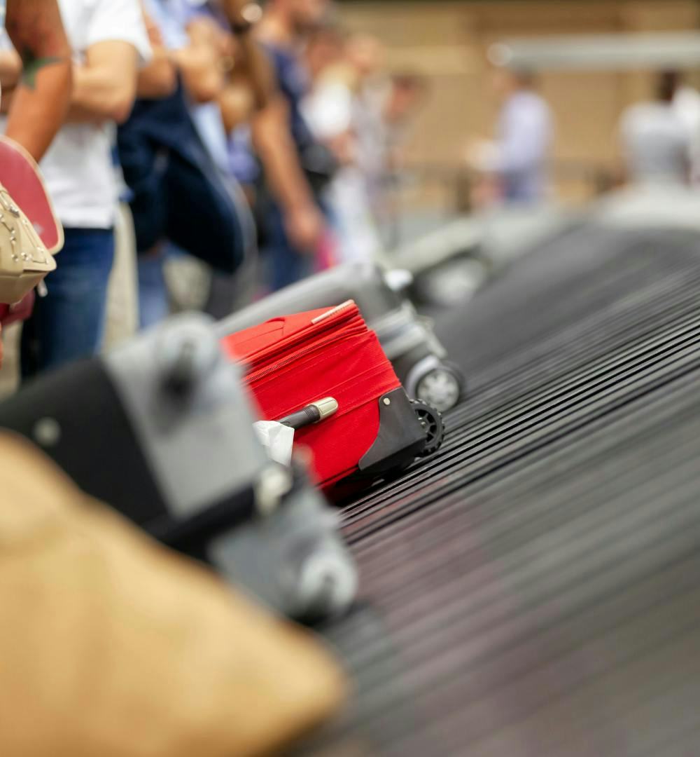 Luggage on a baggage claim conveyer belt