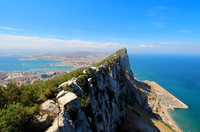The rock of Gibraltar surrounded by sea on either side