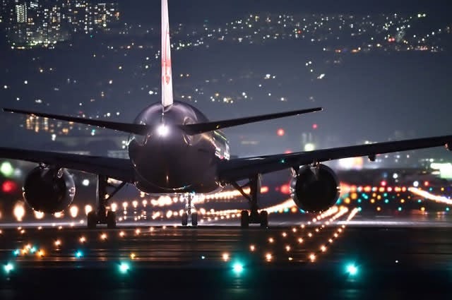Plane on runway at night