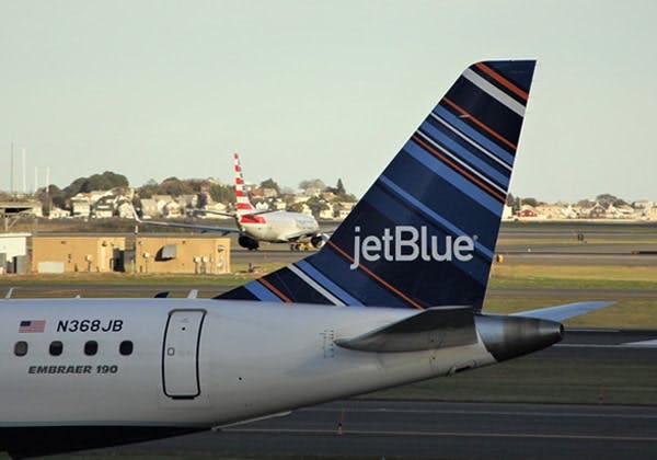 The tail fin of a jetBlue aircraft 