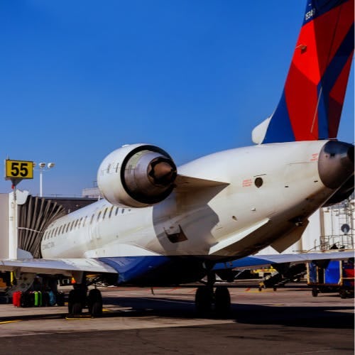 Delta aircraft at an airport gate
