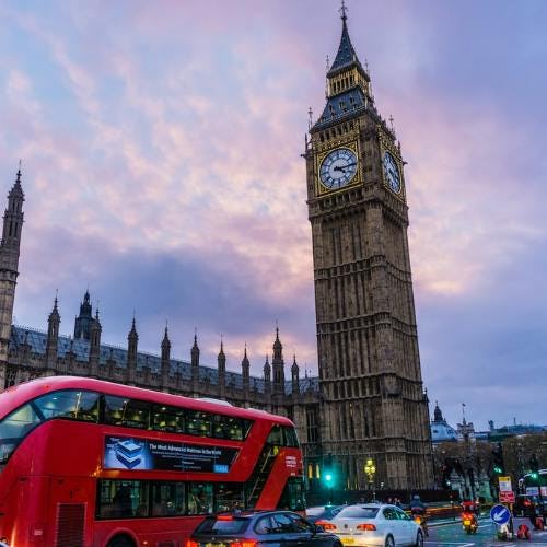 A picture of Big Ben and a London bus