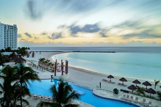 A Cancun hotel at sunset looking out to the Caribbean sea