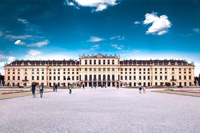 View of the grand yellow Hapsburg palace in Vienna