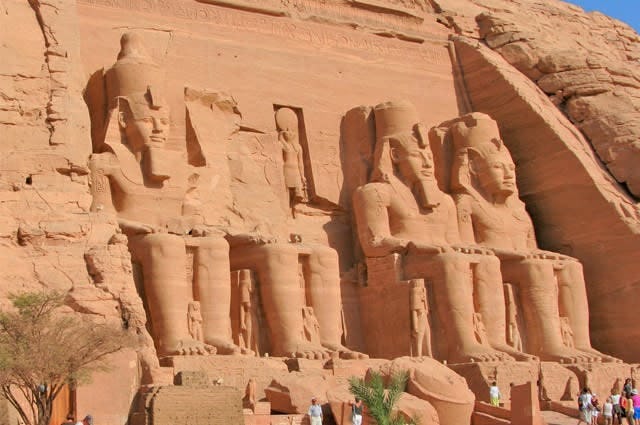 A photo from Egypt, showing Egyptian pharaohs carded out large red rocks