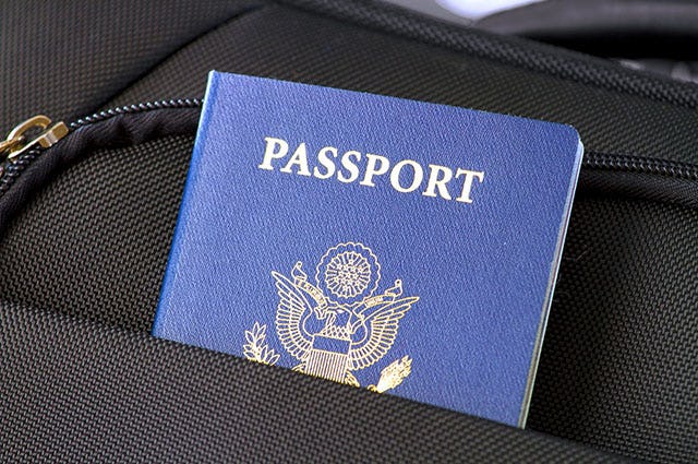 Passport in a pocket on a bag
