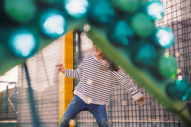 Child playing at a soft play before a long haul flight